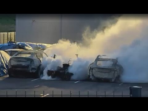 Massive fire at Tesla dealership burns dozens of EVs