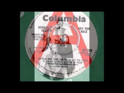 The She Trinity - The Man Who Took The Valise Off The Floor At Grand Central Station At Noon