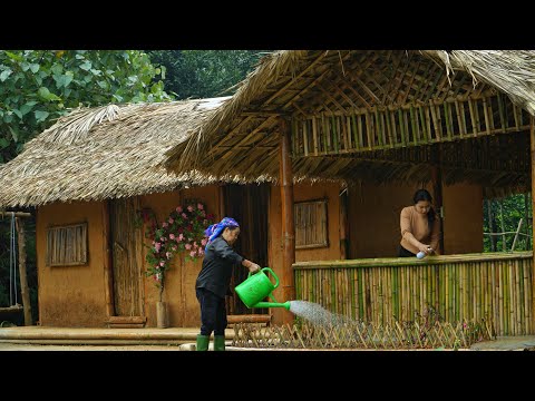 The bamboo wall is coated with a glossy paint | May planted the first flowers for the new house