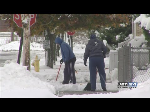 Watch: Erie residents shoveling out after first snow storm of the year