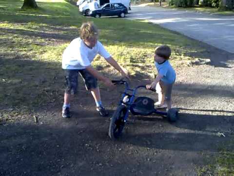 4 year old doing donuts on a trike
