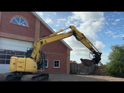 Video: New Holland kobelco E140CSR gravemaskine 1