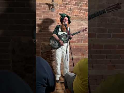 Claude O'Crepe performs "me shamrock's gone all mouldy" at the Citygate Exeter