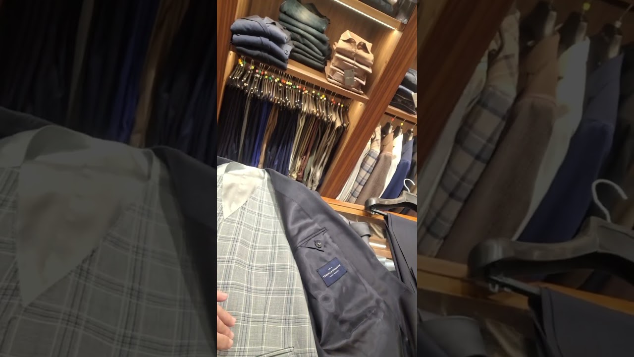 Traje azul con chaleco a medida