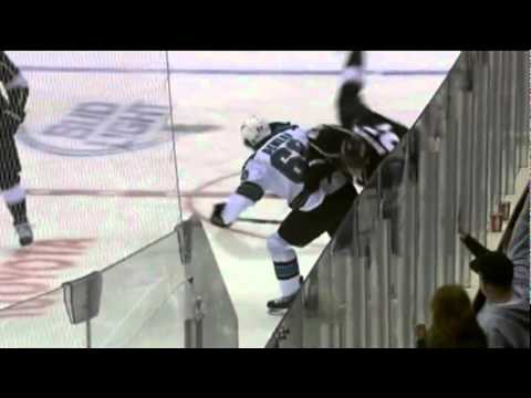 Jason Demers hipchecks Dustin Brown