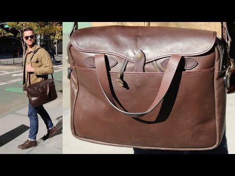 Part of a video titled Is Filson's $1000 Briefcase Worth It? - YouTube