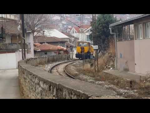 Working rail vehicle and passenger train in Veles, Macedonia