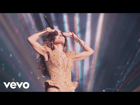 Videoclip de Con Los Ojos Cerrados (En Vivo Desde La Arena Ciudad De México) — Gloria Trevi