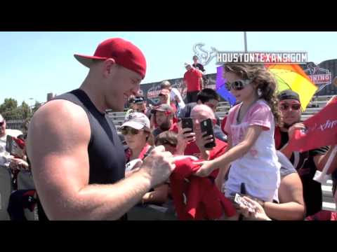 Young Texans fan hugs & kisses J.J. Watt