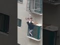 Neighbours rescue boy dangling from 4th-floor window in China #ytshorts