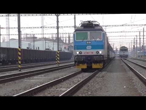 163.048-2 vjíždí s vlakem Sv 1306 na přednádraží olomoucké stanice | nová sestava vlaku