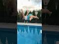 Running And High Dive Jumping Into The Swimming Pool With Clothes On Shorts