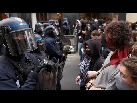 France halts stun grenade use after boy's hand blown off in student protests