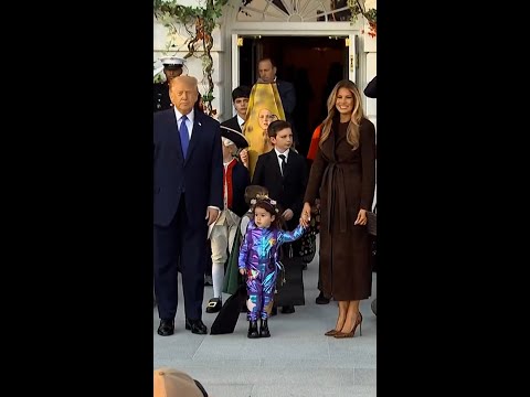 Trump, first lady greet trick-or-treaters at White House
