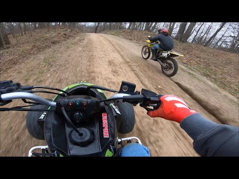 ARCTIC CAT DVX 400 and SUZUKI RMZ250 GO HEAD TO HEAD!!