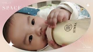 老師看著我、教著我,用我自己的小手，幫自己喝奶，雙手萬能，棒