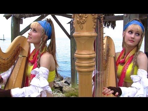 Blonde Twins Playing Final Fantasy Music While Standing Next To A Lighthouse