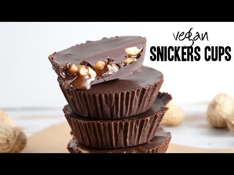 Vegan Snickers Cups | Roasted Peanuts and ooey caramel sauce covered in chocolate!