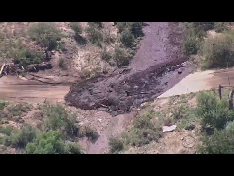 Flash floods tear across Arizona desert