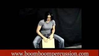 Cajon.  Using both hands in a groove.