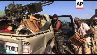 Anti Gadhafi forces secure key ammunition dump