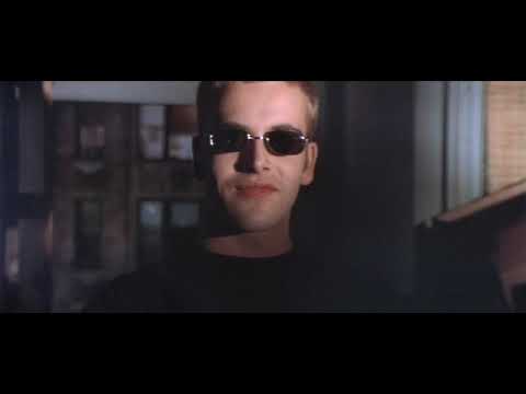 Terminal green mainframe graphic—music acts as metronome for on-screen hacks