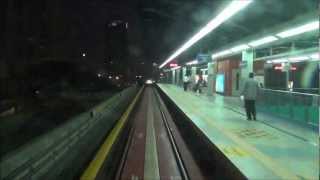 LRT ride in Kuala Lumpur from KL Sentral Station to KLCC at night to see Petronas Towers, Malaysia