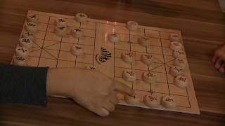 Eröffnung erklärt durch Int. Großmeister Handi Xue