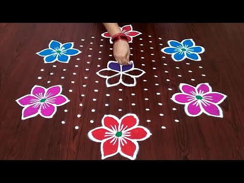 Sankranthi chukkala muggulu 15x8 middle dots/sankranthi special flower kolam designs
