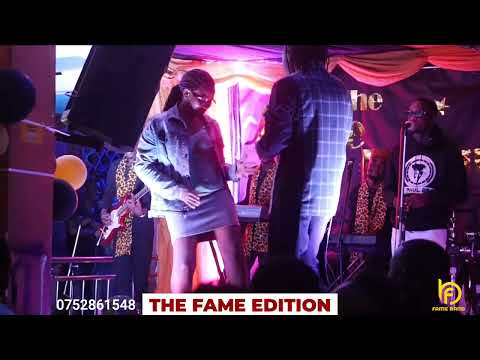 Collins And The Fame Band: T paul performing ekimuli rose ft the Fame Band