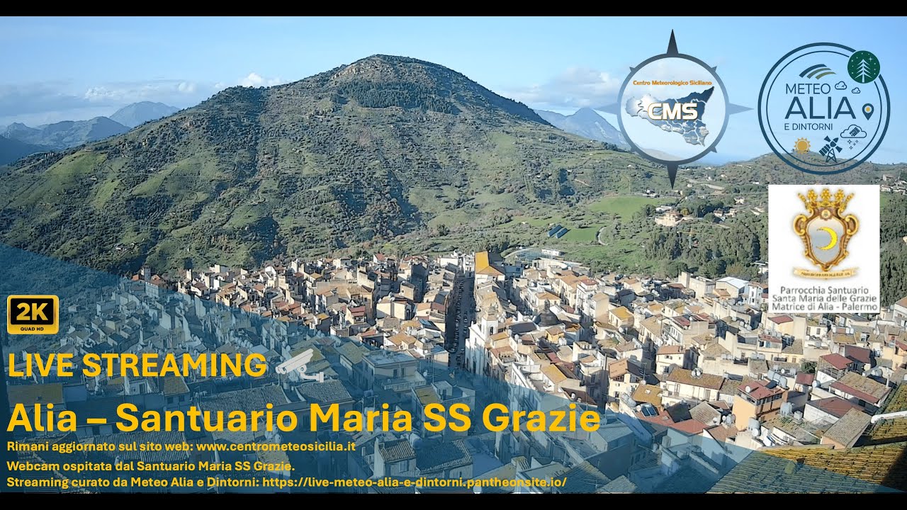 Live webcam view of Alia Rooftops and Mountain Panorama