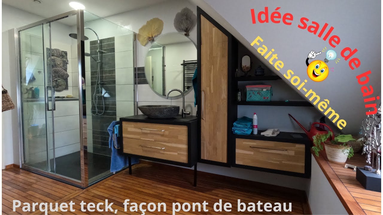 Idée salle de bain, sol pont de bateau en teck. Black wood and stone. Entièrement fait main.