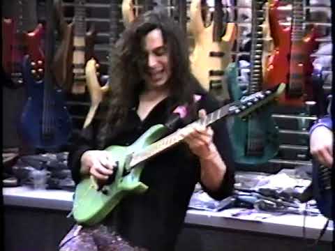 Joey Tafolla performance at NAMM 1992. Songs of his Shrapnel Records album Infra-Blue. Rare footage.