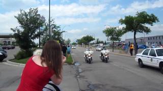 Queen Elizabeth's motorcade in Winnipeg from airport down Wellington Crescent