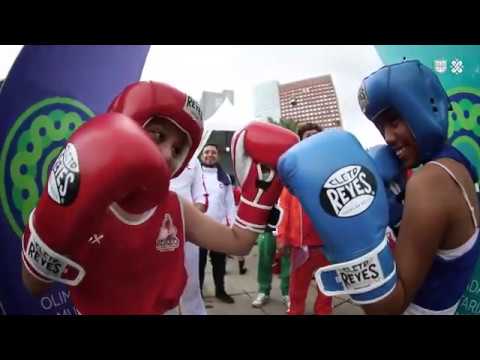 El color de las finales de boxeo de la Olimpiada Comunitaria