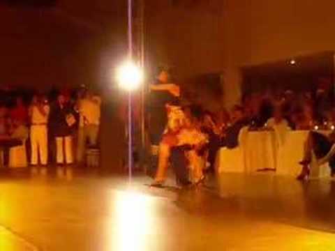  Roberto Herrera  and  Jorgelina Guzzi  are  dancing  to  the  milonga  "  Milonga Sentimental  "