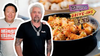 Guy Fieri + Ming Tsai Eat MONEY Tteokbokki Mac & Cheese | Diners, Drive-Ins and Dives | Food Network