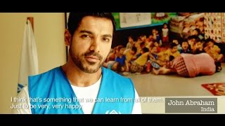 Refugees dancing with John Abraham to the ‘Happy’ song by Pharrell Williams