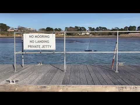 Radio Controlled 6 meter racing yacht sailing on the river Hamble.