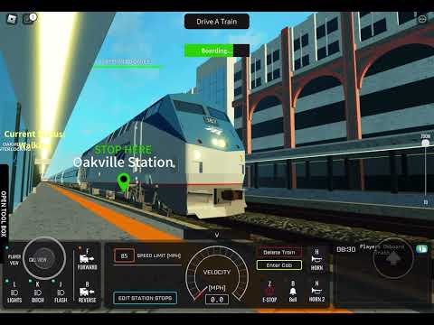 Amtrak P42DC no. 167 Maple Leaf departing Oakville in Lakeshore West Railway