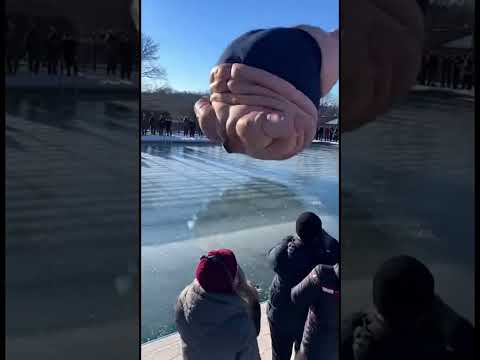 Checking the Strength of Ice After Jumping into a Pool
