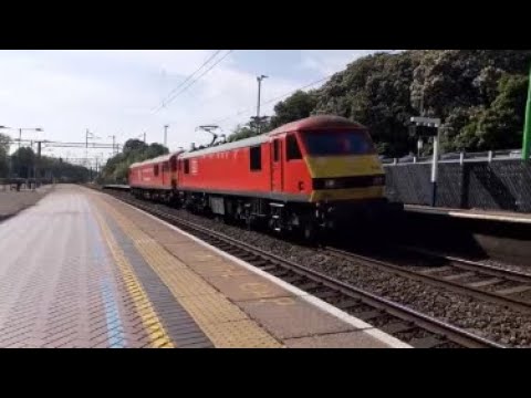 DB Cargo UK 90035 passes through Berkhamsted with 92015 In tow 24/05/23