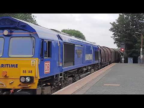 Class 66 Maritime 7. 66148 passing Stourbridge on the morning Round Oak to Margam steel.