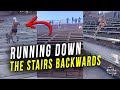 Guy Running Down The Stairs Backwards At Red Rocks