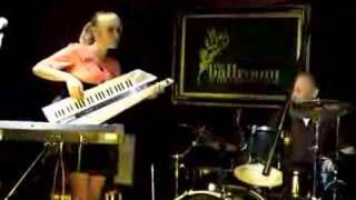 Lisa Crawley plays keytar