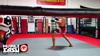 Gilbert Melendez hits pads in preparation of UFC 181