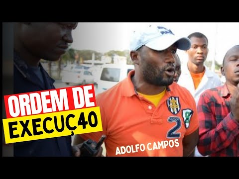 Detenção do ativista Adolfo Campos. Momento q o agente da polícia ordena sua execuç4o