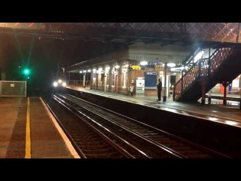 Colas 56302 passes St Denys.