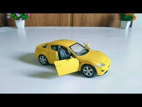 Металлическая машинка Kinsmart 1:36 «Mazda RX-8» KT5071D инерционная / Красный