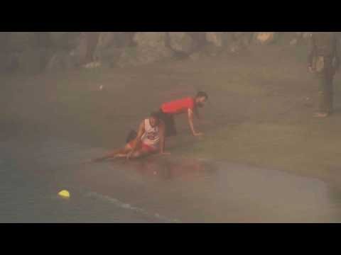 Video Thumbnail: Exhausted migrants collapse on Ceuta beach
